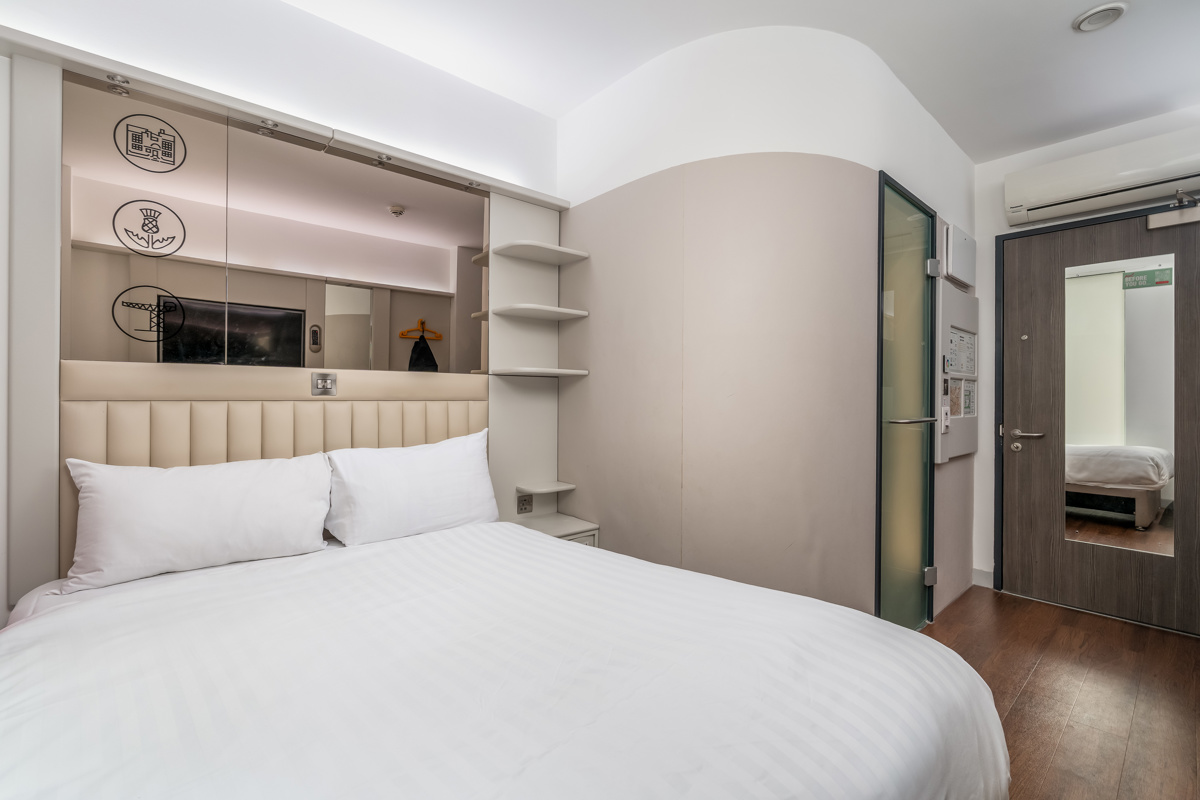 Double room with city wall artwork at Point A Hotel Glasgow