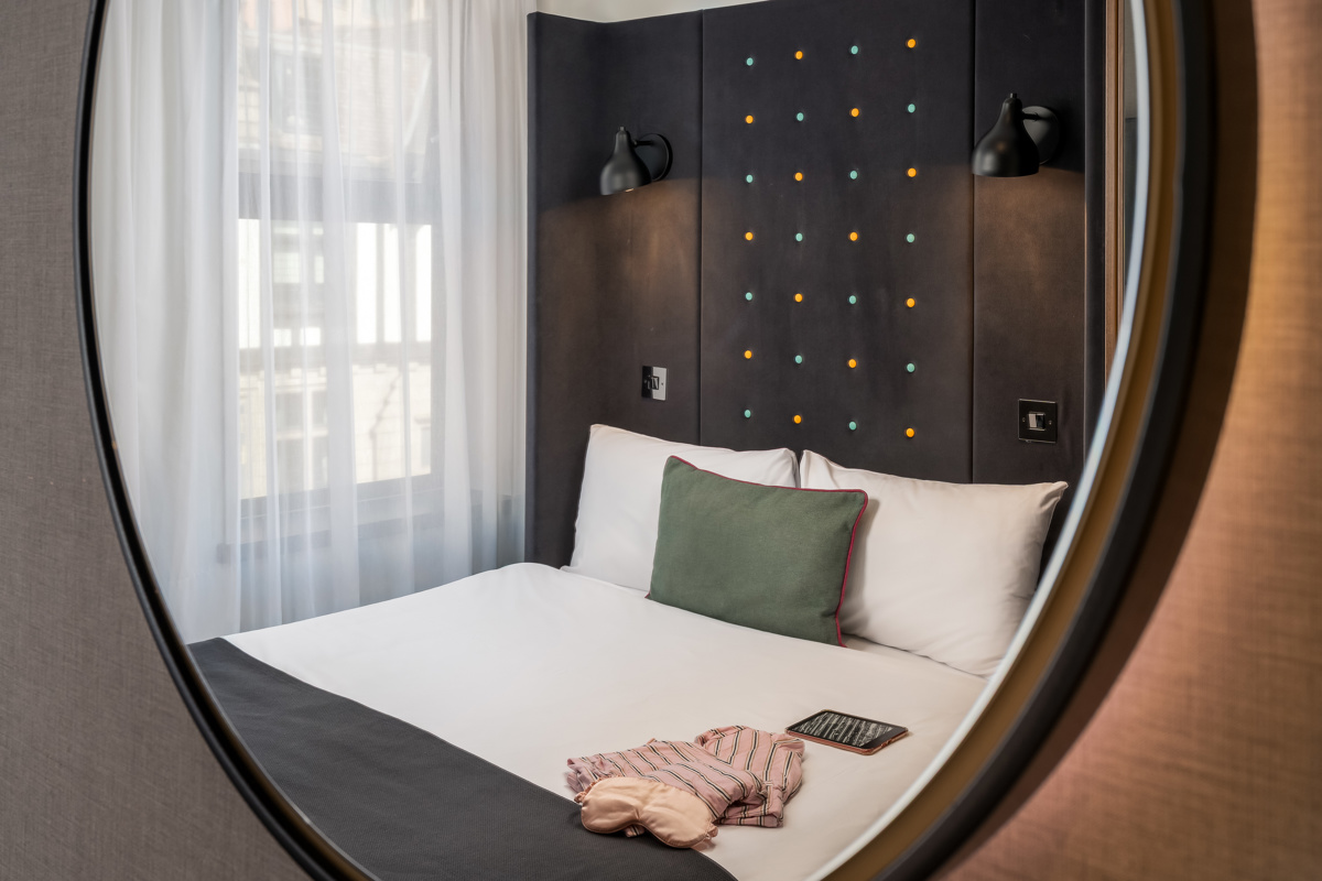 Twin room with two single beds and modern décor at Point A Hotel Paddington